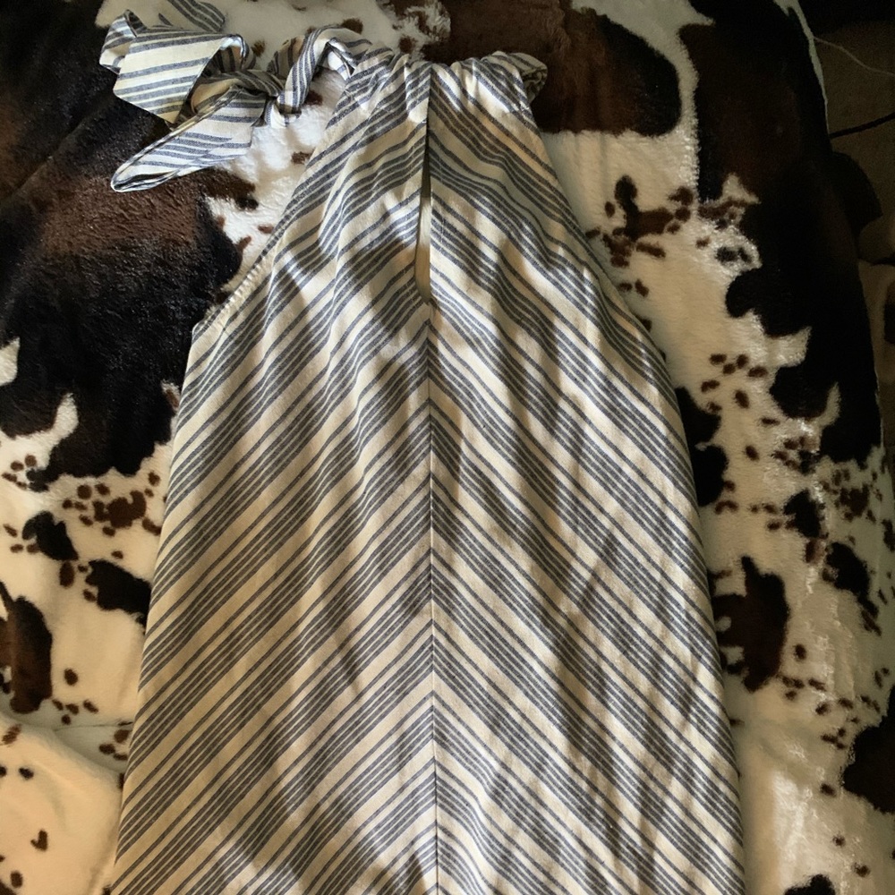 Pom Pom bottom summer dress. Tie neck makes for an elegant look.